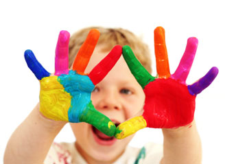 Boy with painted hands